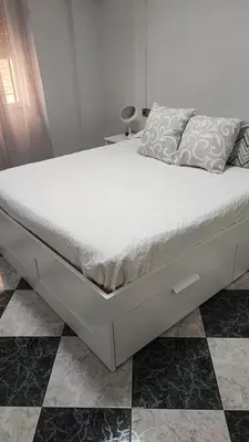 Cama o camas de una habitación en Teniente Bago con opción de aparcamiento