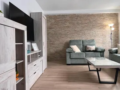 Una televisión o centro de entretenimiento en Apartamento El Rinconcito del Chache