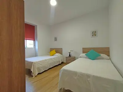 Cama o camas de una habitación en Apartamento Acerota, con parking gratuito