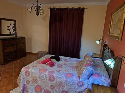 Cama o camas de una habitación en Casa El Albero (Torcal-Caminito del Rey)