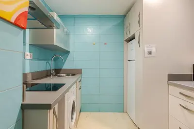 Una cocina o zona de cocina en En Patio sevillano Alameda-Isla Magica