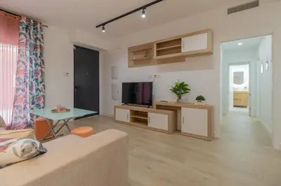 Una televisión o centro de entretenimiento en Apartamento La Prevision