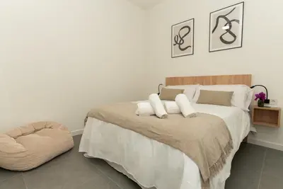 Cama o camas de una habitación en La Magdalena I y II