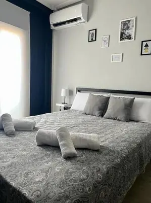 Cama o camas de una habitación en Apto Familiar Balcones a la Muralla