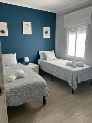 Cama o camas de una habitación en Apto Familiar Balcones a la Muralla