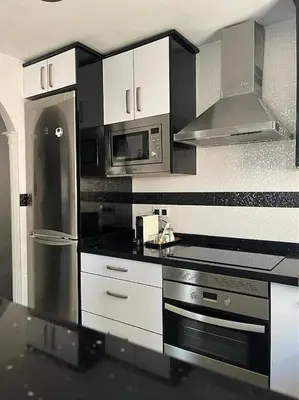 Una cocina o zona de cocina en Apto Familiar Balcones a la Muralla