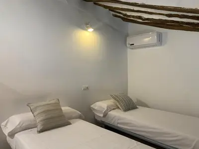 Cama o camas de una habitación en Casa Genilla