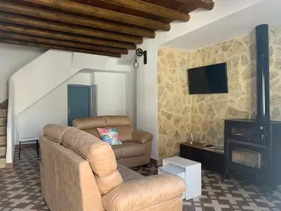 Una televisión o centro de entretenimiento en Casa Genilla