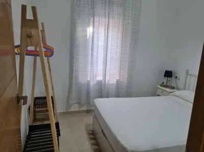 Cama o camas de una habitación en Apartamento en el Fontanal, Casa- Patio de vecinos