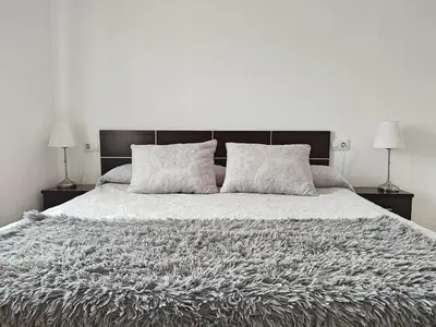 Cama o camas de una habitación en Ático Gran Terraza Villa Luz