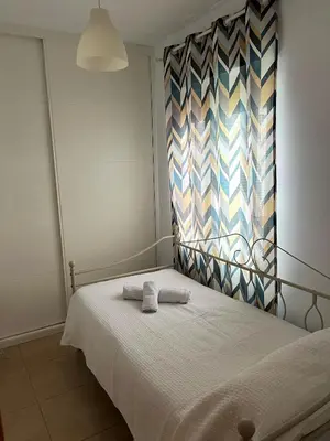Cama o camas de una habitación en Ático Gran Terraza Villa Luz