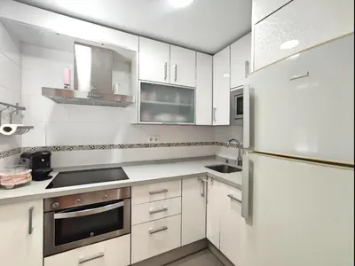 Una cocina o zona de cocina en Ático Gran Terraza Villa Luz