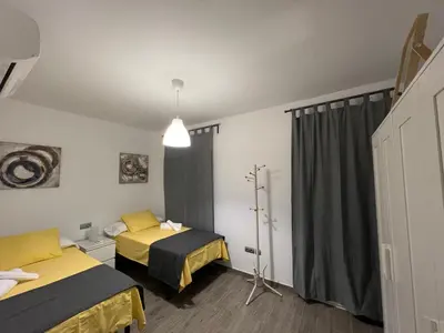Cama o camas de una habitación en Azahar Macarena