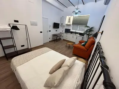 Una televisión o centro de entretenimiento en Apartamentos Casa el Gorras