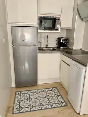 Una cocina o zona de cocina en La Pera Jaén