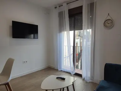 Una televisión o centro de entretenimiento en Apartamento Inés y Manolo