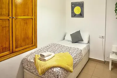 Cama o camas de una habitación en Apartamento Muralla