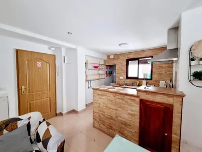 Una cocina o zona de cocina en Apartamento Muralla