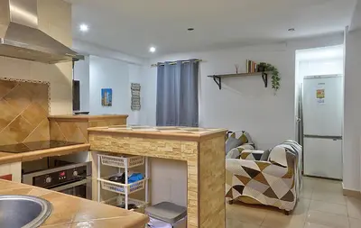 Una cocina o zona de cocina en Apartamento Muralla