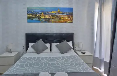 Cama o camas de una habitación en Apartamento Muralla