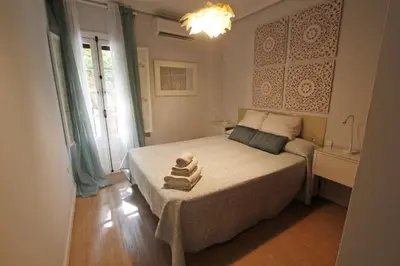 Cama o camas de una habitación en Cultura sevillana - Terraza y Parking Gratis