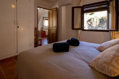 Cama o camas de una habitación en La Jaboneria de Setenil