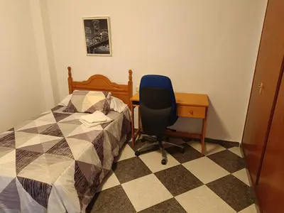 Cama o camas de una habitación en Piso Palomino
