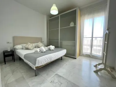 Cama o camas de una habitación en Geysotur El Ático Blanco
