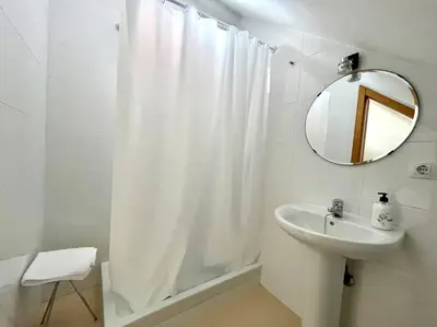 Un baño de Geysotur El Ático Blanco