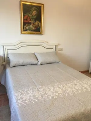 Cama o camas de una habitación en Apartamento El Mirador de Sierra Mágina Noalejo entre Granada y Jaén