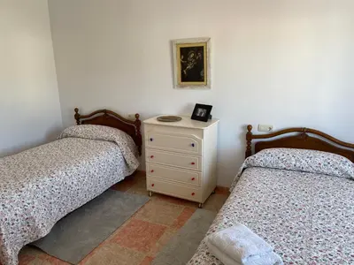 Cama o camas de una habitación en Apartamento El Mirador de Sierra Mágina Noalejo entre Granada y Jaén