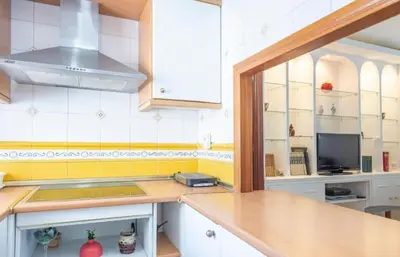 Una cocina o zona de cocina en Las Setas - Refugio Espacioso en el Alma de Sevilla