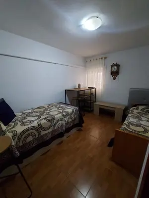 Cama o camas de una habitación en Apartamento acogedor Córdoba