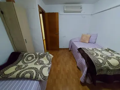 Cama o camas de una habitación en Apartamento acogedor Córdoba