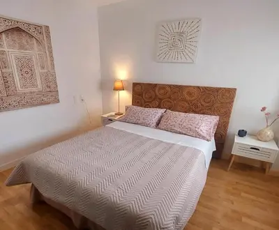 Cama o camas de una habitación en Victoria Stay Terraza Vistas y Garaje incluido