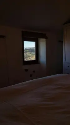 Cama o camas de una habitación en El Paraíso Perdido