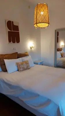Cama o camas de una habitación en El Paraíso Perdido