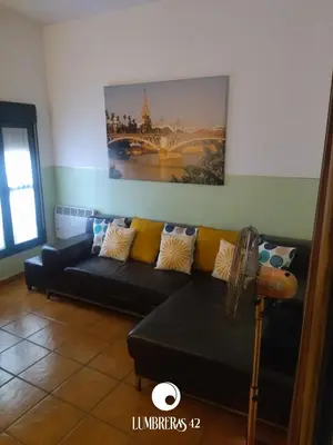 Zona de estar de Lumbreras 42 Apartamento, cerca de Isla Mágica y Estadio de la Cartuja