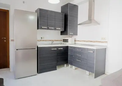 Una cocina o zona de cocina en Sunny Holiday Apartment in the historic centre- Private Parking