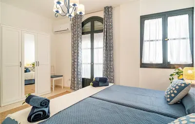 Cama o camas de una habitación en Amazing Apartment In Carmona With Wifi