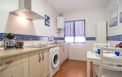 Una cocina o zona de cocina en Amazing Apartment In Carmona With Wifi