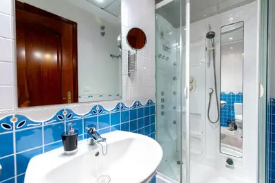 Un baño de Center of Seville! Luxury apartment in Sevillian Manor House!