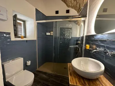 Un baño de Tajito Romano