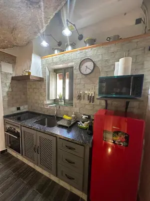 Una cocina o zona de cocina en Tajito Romano