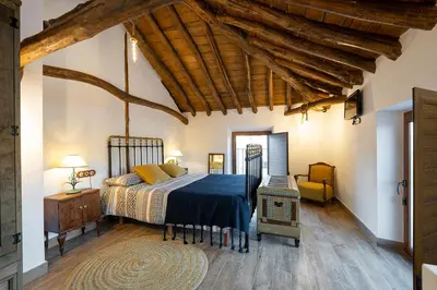 Cama o camas de una habitación en Pintoresco Alojamiento Rural La Camarilla