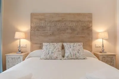 Cama o camas de una habitación en San Luis Downtown & Pool Apartment