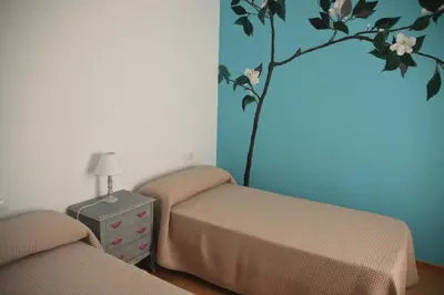 Cama o camas de una habitación en La casa de Cantarico