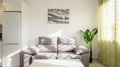 Zona de estar de Lovely apt in the city center - 15m walk Giralda