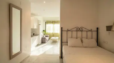 Cama o camas de una habitación en Lovely apt in the city center - 15m walk Giralda