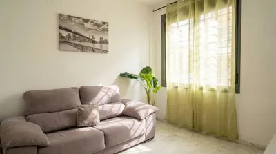 Zona de estar de Lovely apt in the city center - 15m walk Giralda